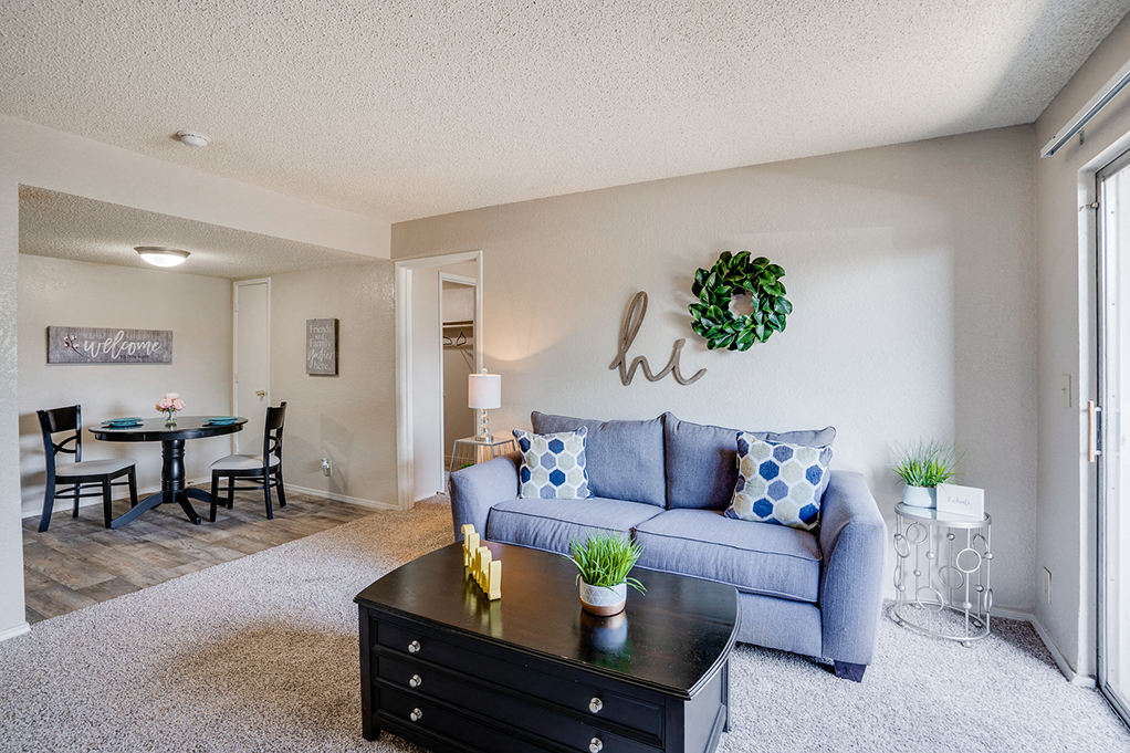 a living room with a couch and a table